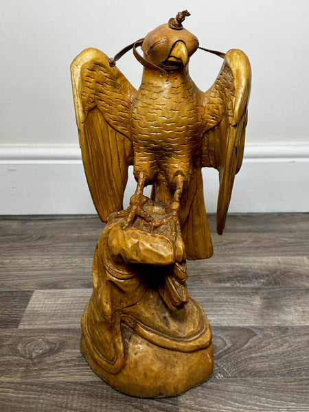 Carved Peregrine Falcon With Various Leather Hoods Sculpture - Cheshire Antiques Consultant